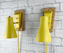 Load image into Gallery viewer, Mid Century Yellow Pair of Wall Lights.